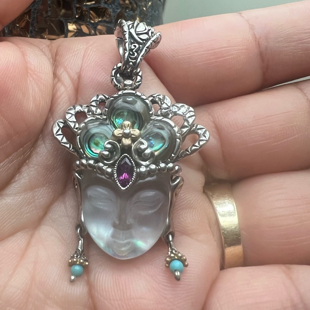 Artistic Silver and 18k Face with beautiful carved stones Pendant